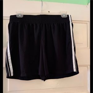 Champion Size Medium Athletic Shorts. Black with double white stripes.